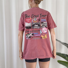 a woman standing in front of a white curtain