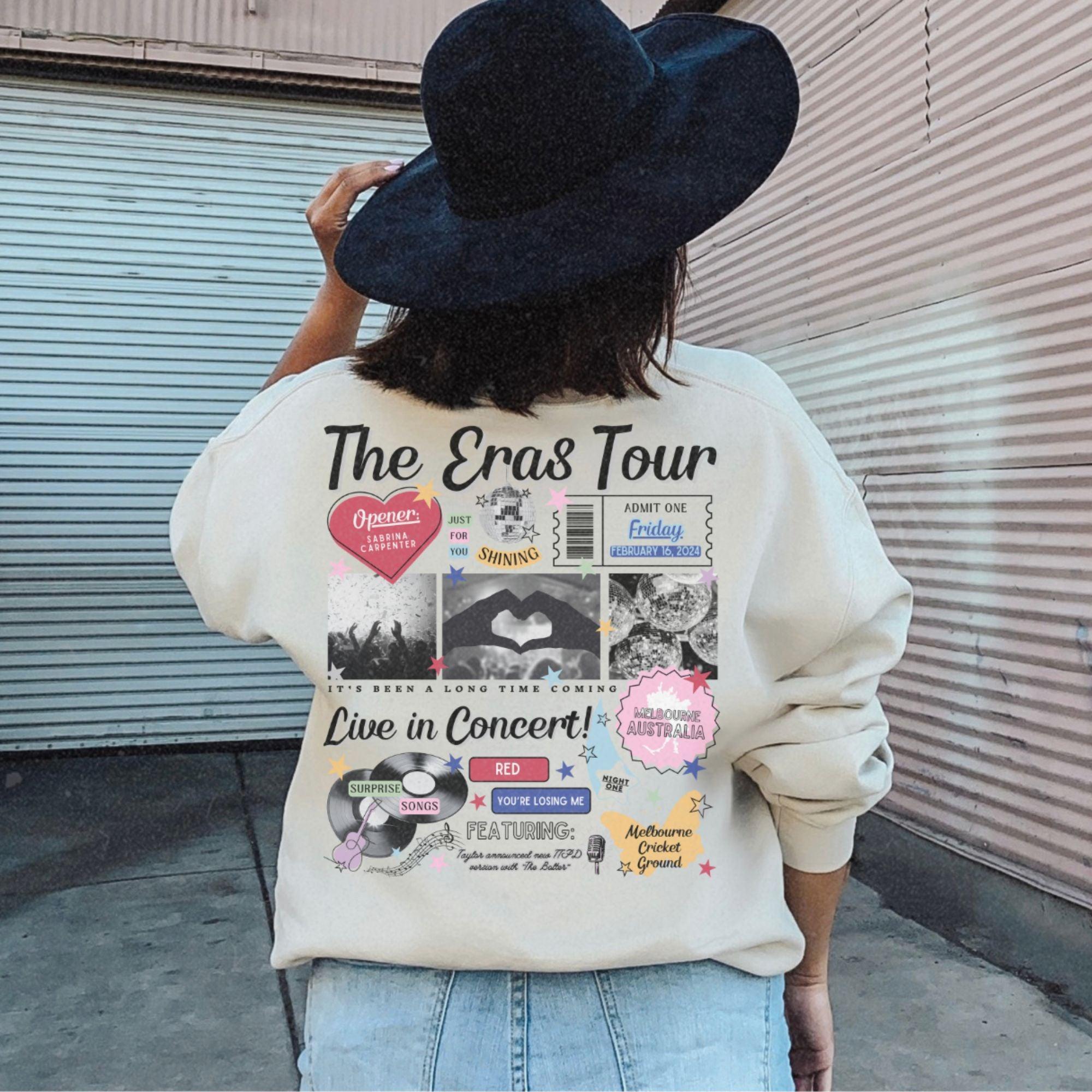 a woman wearing a hat and a sweatshirt