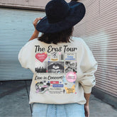 a woman wearing a hat and a sweatshirt