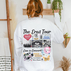 a woman wearing a white sweatshirt with the words the eras tour printed on it