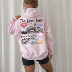 a woman wearing a pink hoodie with photos on it