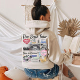 a woman sitting on a stool reading a book