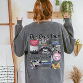 a woman wearing a grey sweatshirt with the words the cross tour printed on it