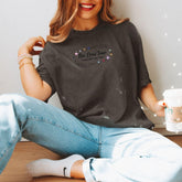 a woman sitting on the floor with her legs crossed