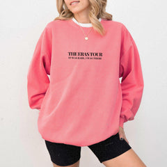 a woman wearing a pink sweatshirt with the phrase the easy to it on it